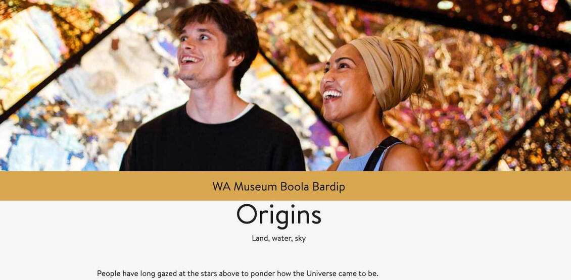 Man and woman in front of coloured mineral backgroubd